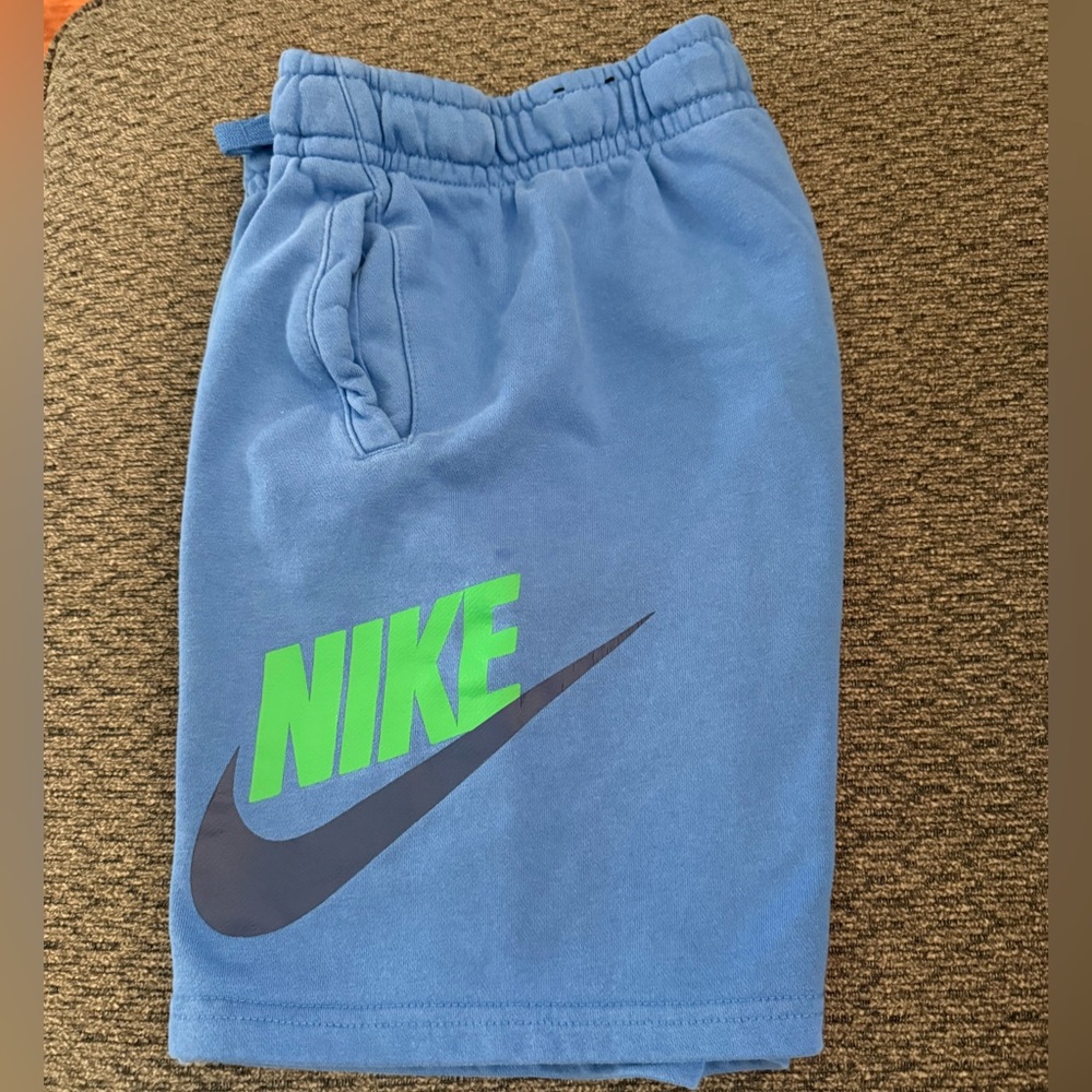 Nike Sportswear Club Fleece shorts royal blue with green Nike and black check